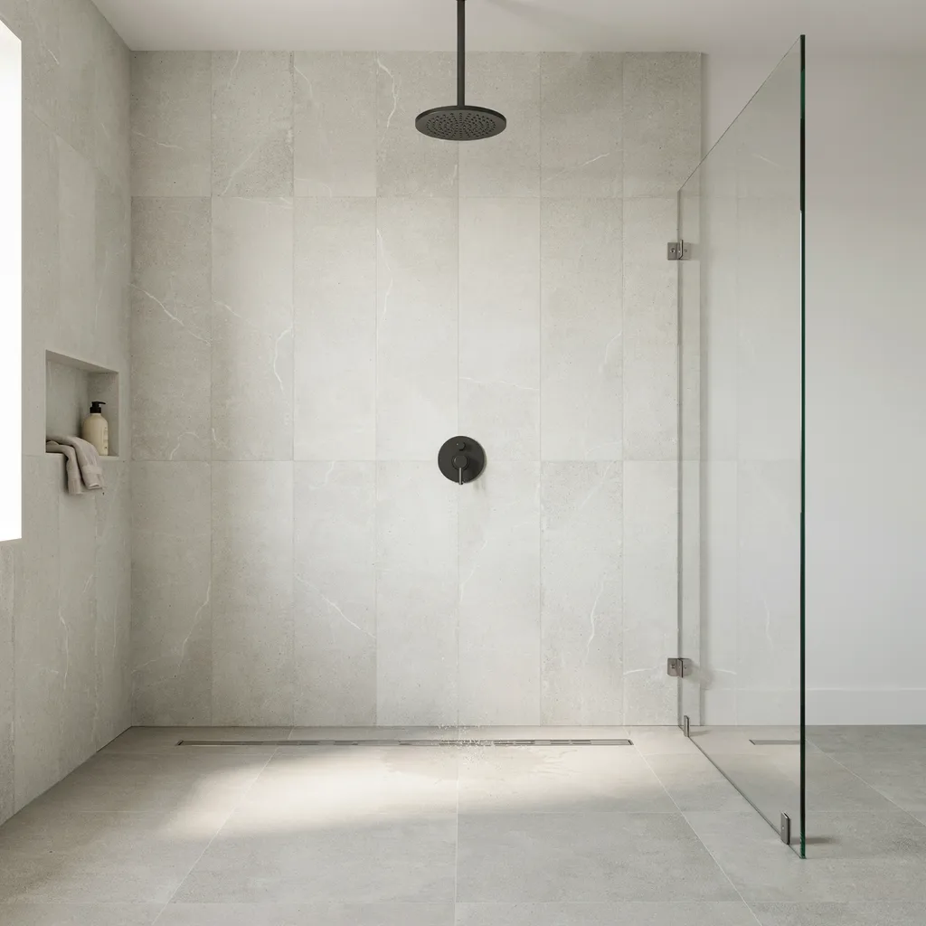 Fluted reeded glass privacy partition next to a toilet in a stylish modern bathroom