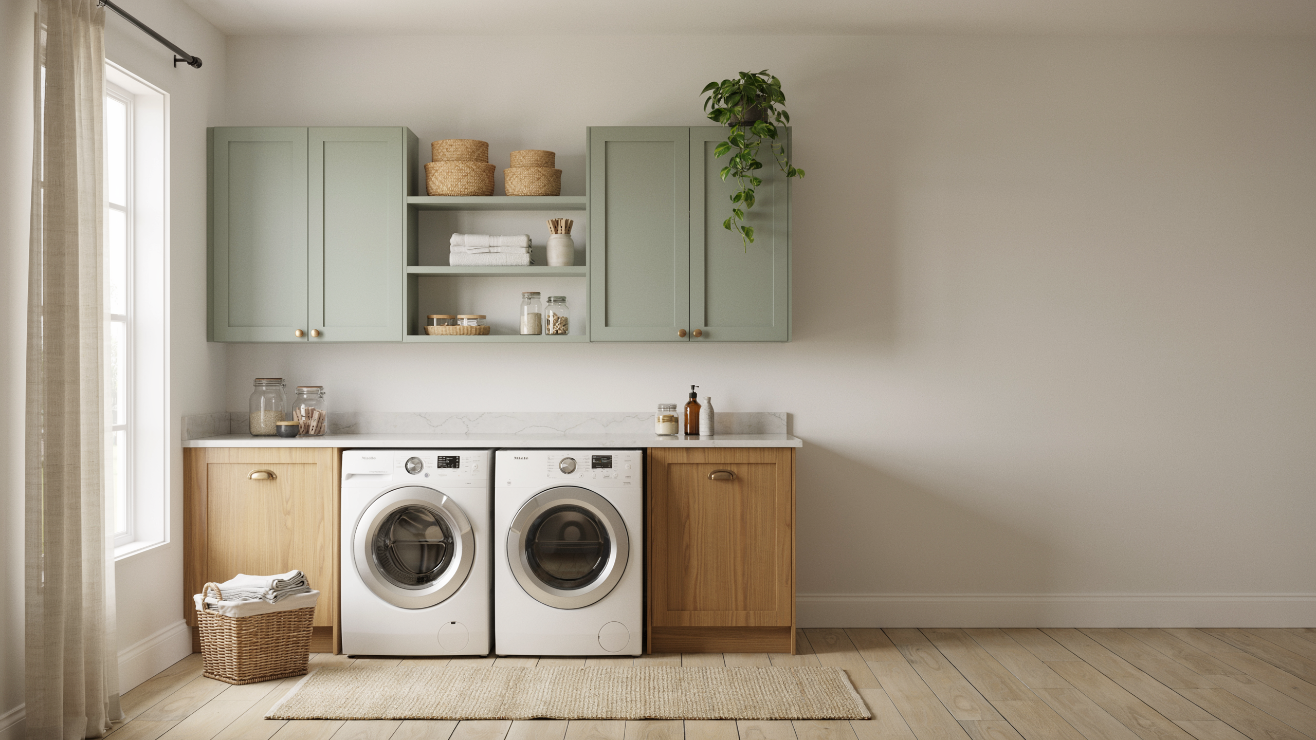 Elegant laundry room with quartz counter and brass hardware