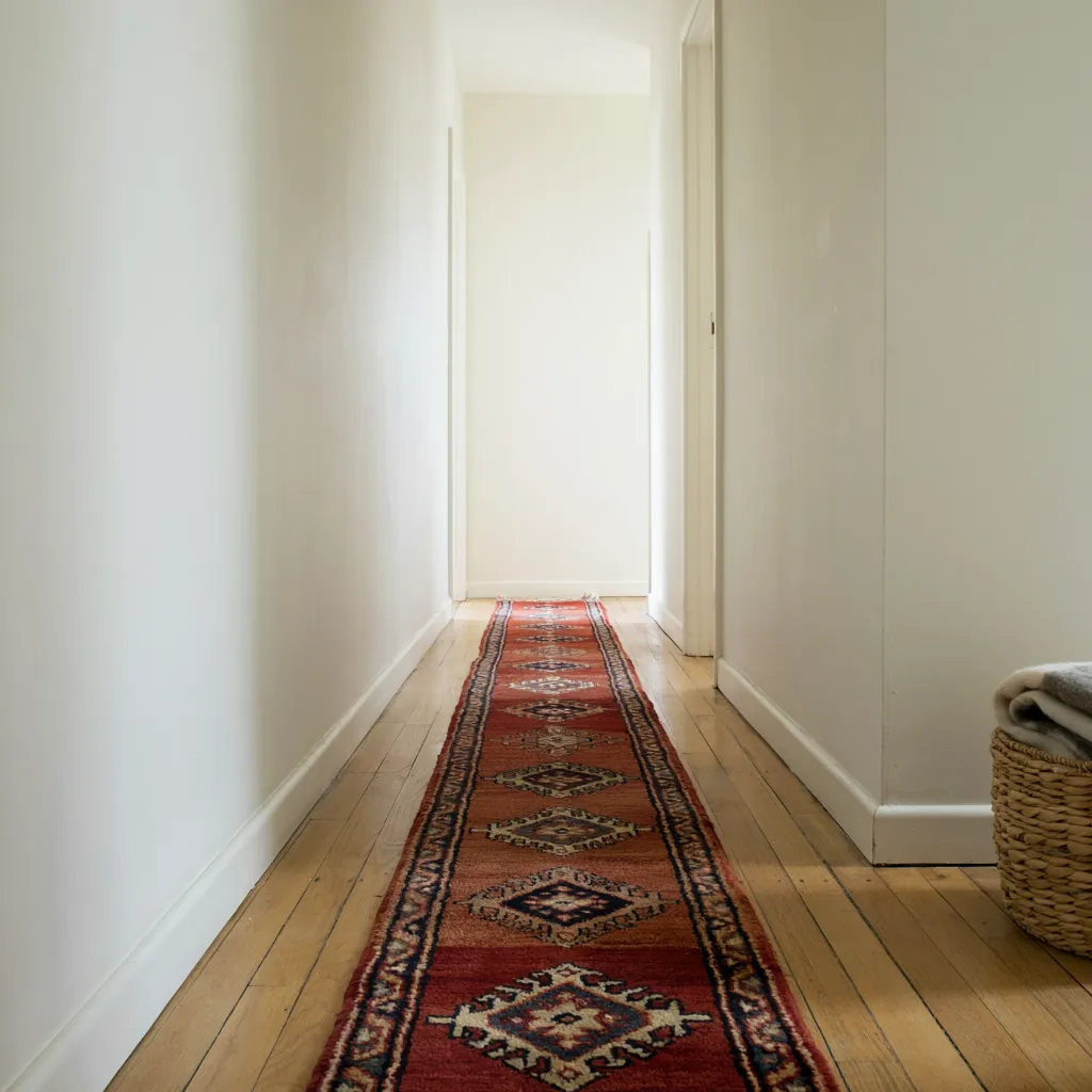Vintage wool runner rug in hallway